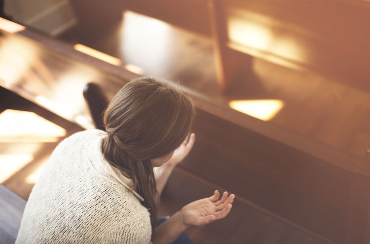 woman worshipping alone - is speaking in tongues for today?