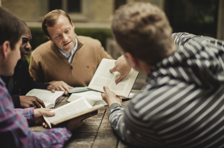 Men looking at their Bibles - which Bible translation should I be using?