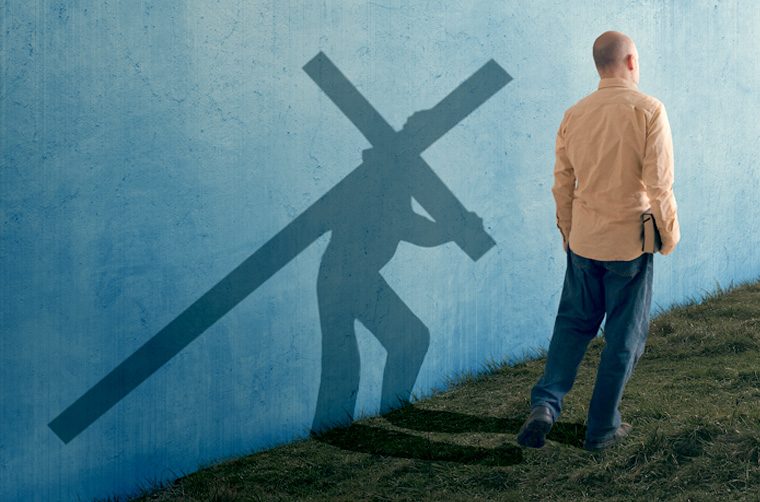 Man carrying cross - Are you a true disciple or a false disciple of Jesus Christ?