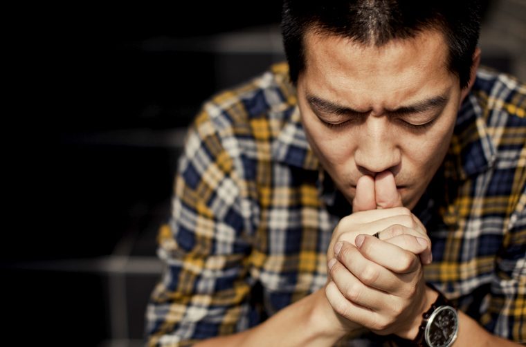 Man praying - What happens when you fast?