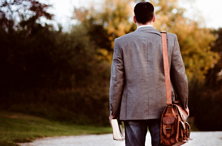 Man holding Bible, facing road - What should be the goal of every single minister in the world?