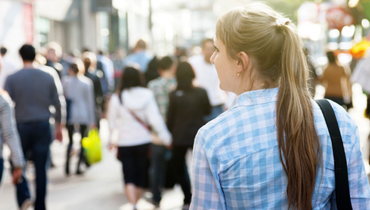 Woman in crowd of people