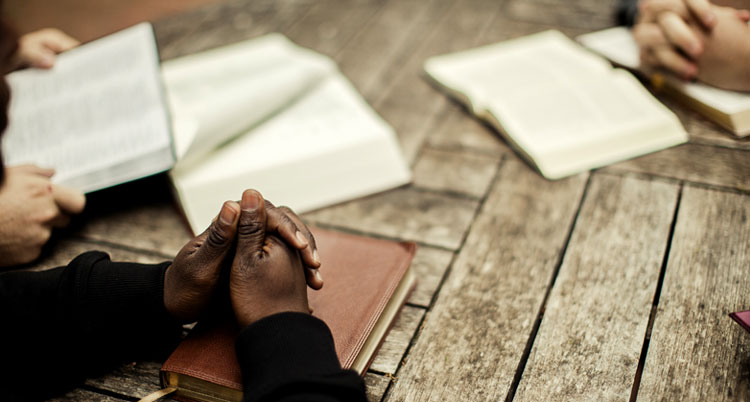 Men studying Bibles