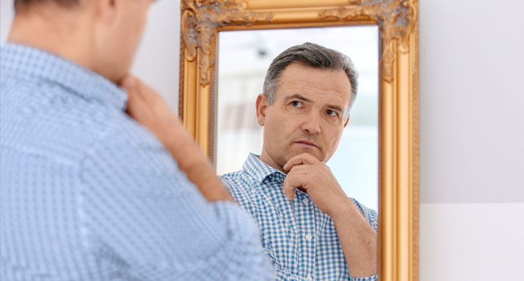 Man looking in mirror - "Am I a Pharisee?"