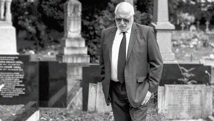 Man in cemetery wondering why we all die